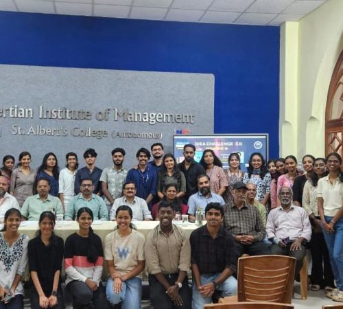 Photo with Chief Guest and Participants at Albertian Institute of Managment Ernakulam